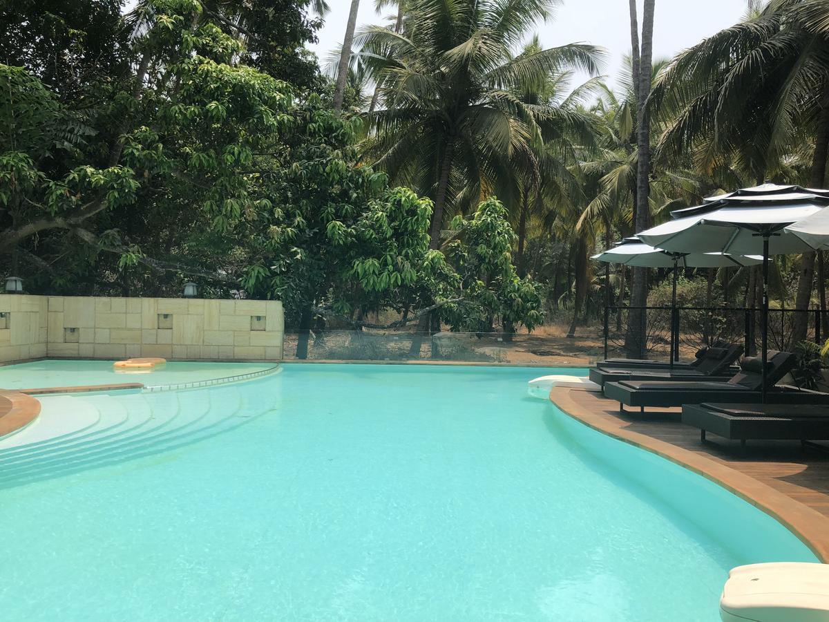 Hotel Coco Goa à Arpora Extérieur photo