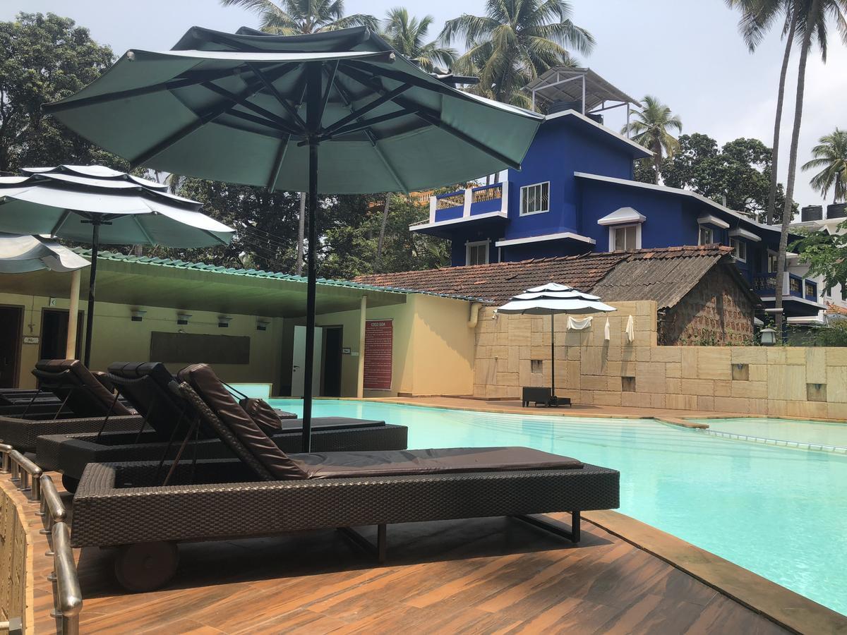 Hotel Coco Goa à Arpora Extérieur photo